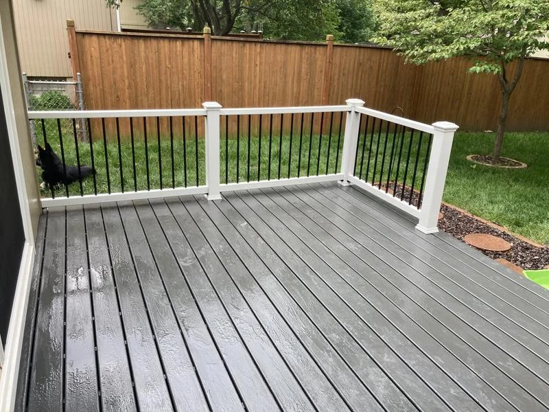 Finished composite deck with white railing